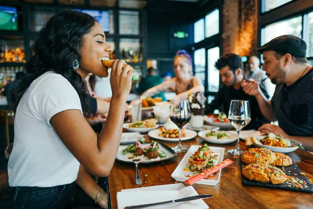 Image of people eating at restaurant - for Restaurant Franchise Talent Acquisition Project